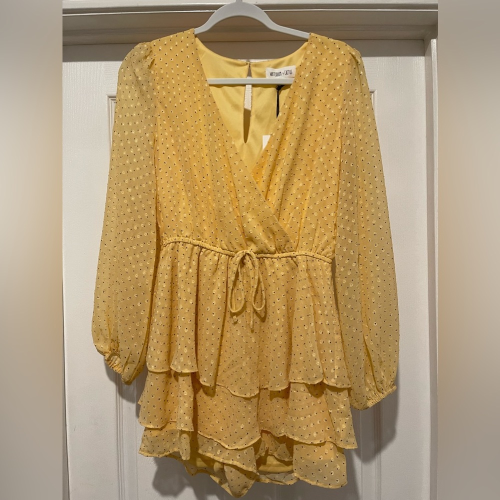 Yellow/gold romper with black polkadots